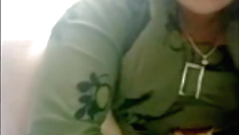 Busty brunette indian amateur shows naked body in the webcam