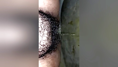 hairy amateur porn video with a hairy woman in the bed