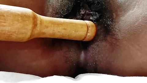 Indian aunty masturbating with a dildo and cumming