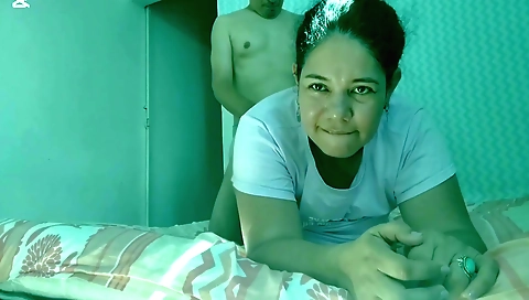 Hot brunette milf sucking and rubbing in her pussy