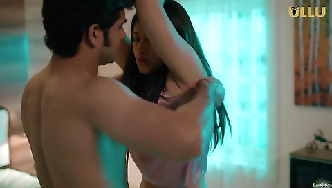 Brunette babe in a net is on the net and making a video