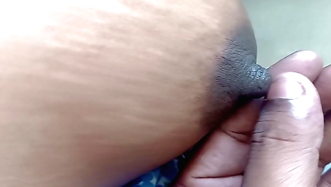 Indian woman plays with her natural tits in a naughty manner