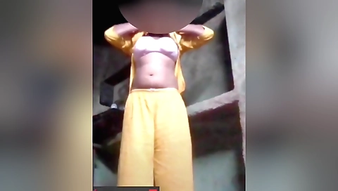 Amateur brunette with huge tits plays with her clit