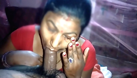 Indian brunette girl in brown dress eats cum in mouth