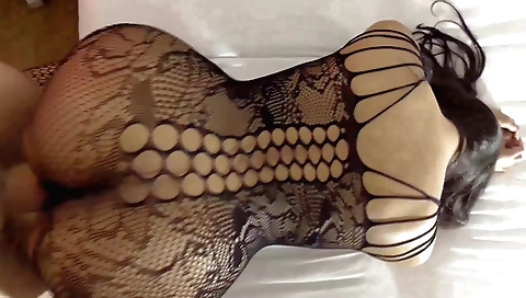 Amateur girl in a sexy outfit plays with her hairy pussy