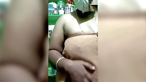Indian teen is having a private bath in the kitchen