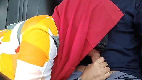 Indian girl in her car is having fun with her boyfriend
