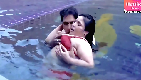 Chubby mature lady is with a large boyfriend on the bench