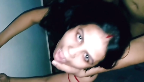 Hot Indian brunette is on the couch sucking and fingered