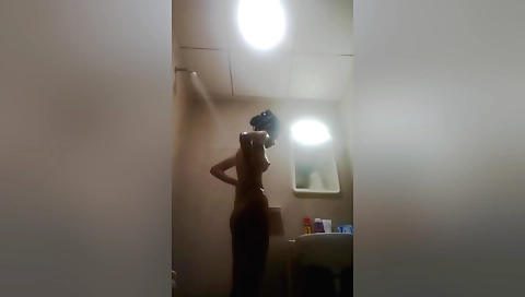 Brunette indian with a natural body naked in bathroom