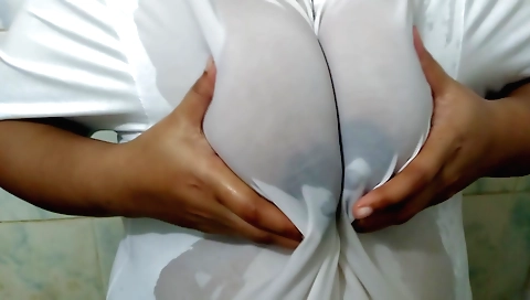 Nasty indian chick in oil showering and getting naked