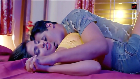 Bright brunette milf paints her body and takes off her clothes