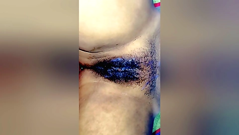 Hairy indian girl swallows all the water from her pussy