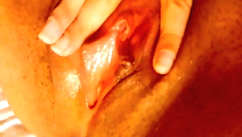 Latina brunette in sexy lingerie is naked on the couch