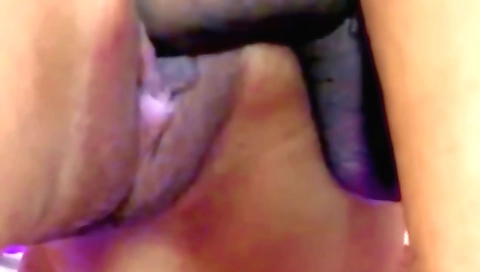 Indian chick in a tight black dress sucks on a cock