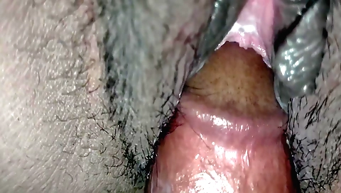 Hairy young amateur milf is having fun with a hard dick