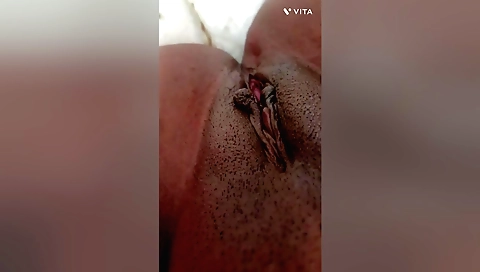 Solo indian chick in brown dress dances in bath in india