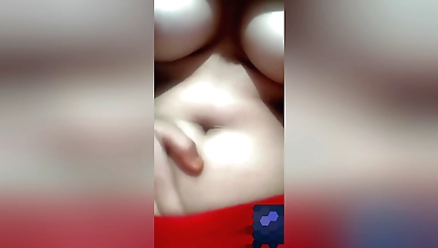 Busty babe in a sexy dress on homemade amateur video