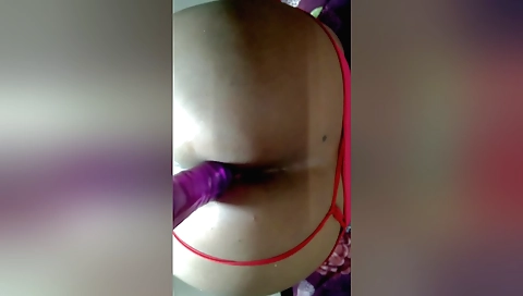 Indian hottie is getting fucked by a dildo in her ass