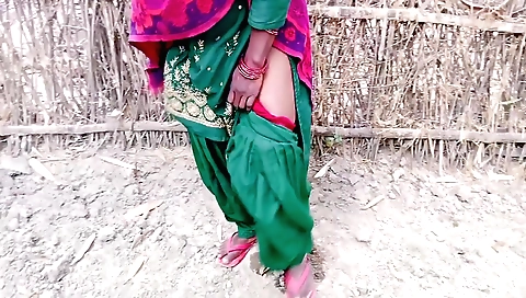Indian solo female fingers outdoors and touches legs