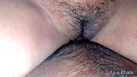 Hairy pussy of a hawker lubricates and plays with her lover